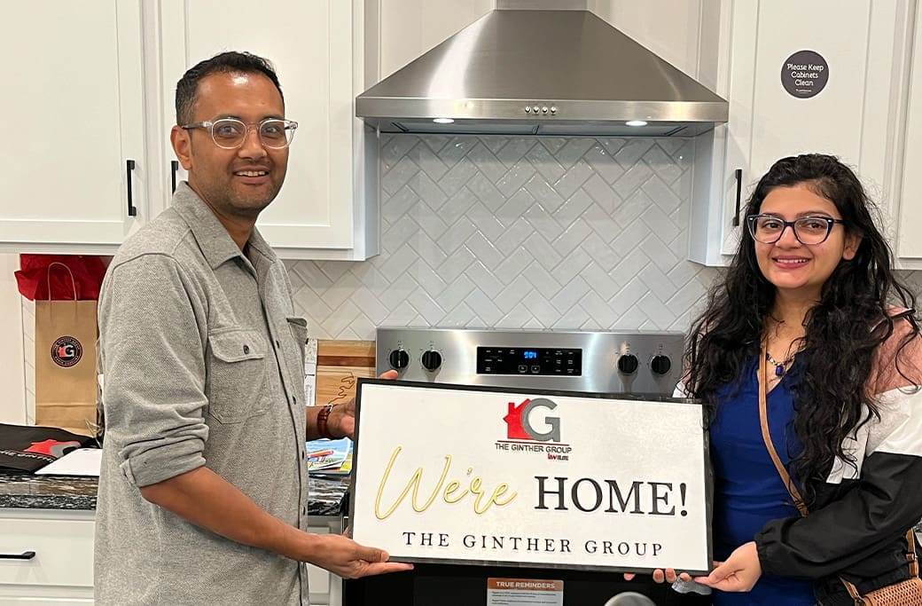 Home buyers celebrating their new Winston-Salem home purchase