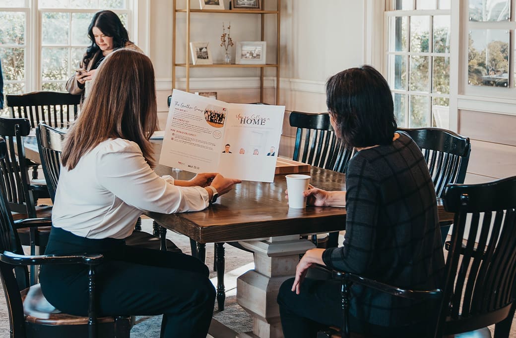 A Realtor talking through a seller's home while explaining the home selling process.